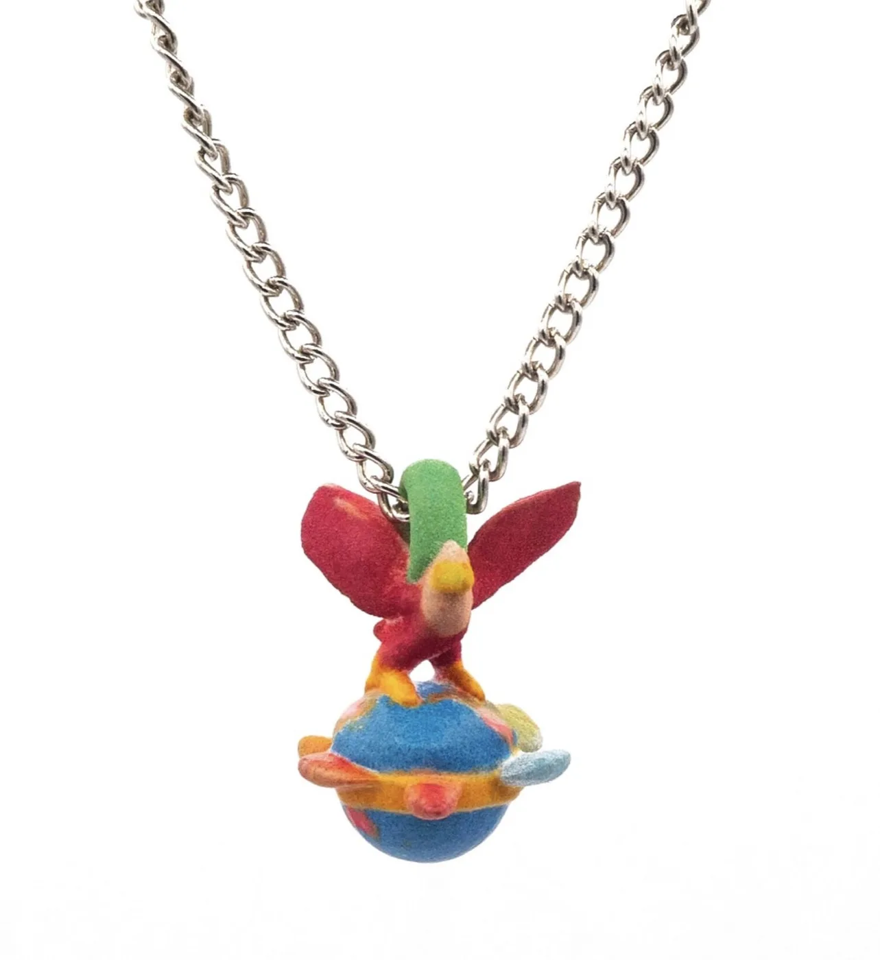 Amema charm necklace: red-winged fairy standing on a small blue planet