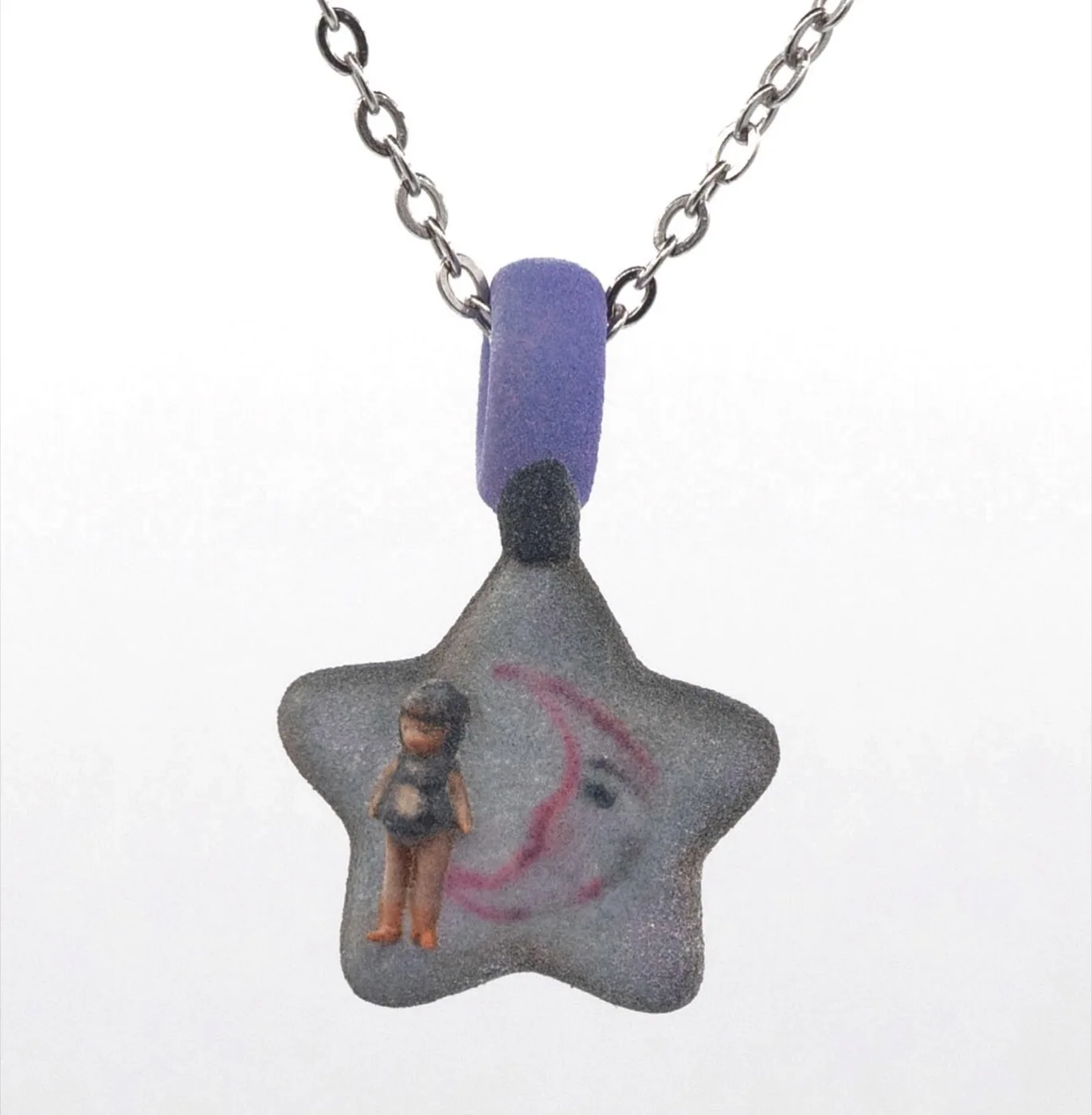Amema charm necklace: gray star with a small doll and a pink crescent moon face