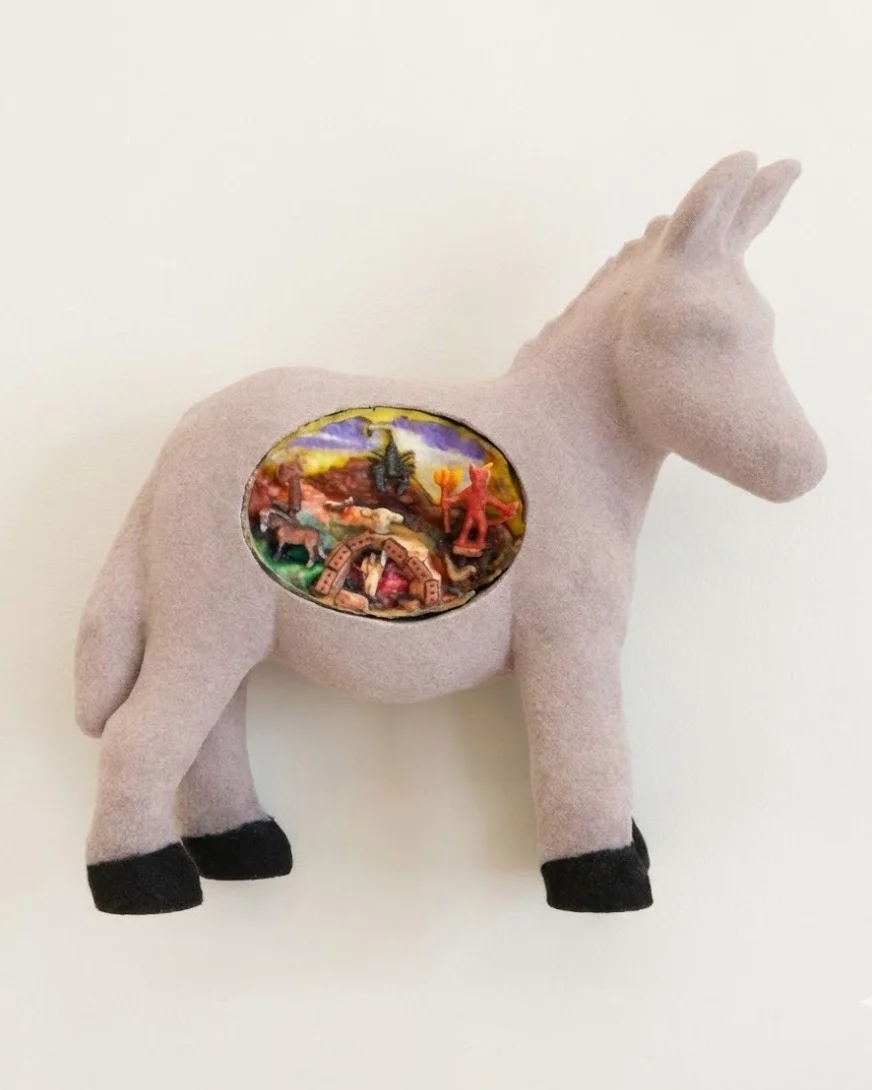 Sculpture of a donkey seen from below